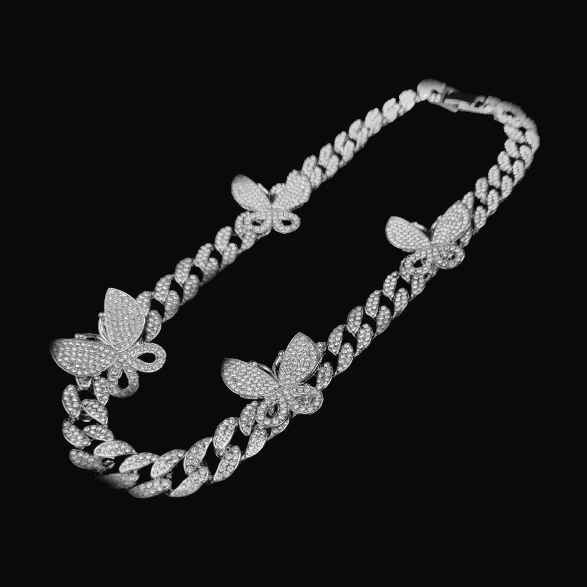 Pulsera cubana iced con mariposas plateada 20 cm